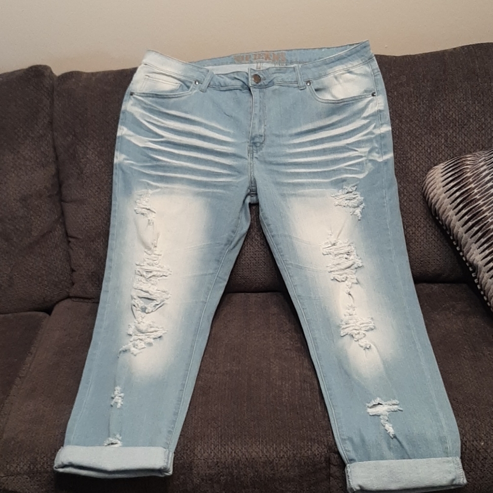 Faded distressed and ripped jeans